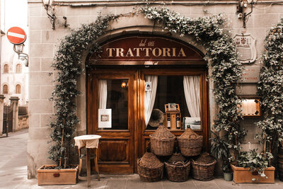 Trattoria restaurant store front stylized to look warm vintage