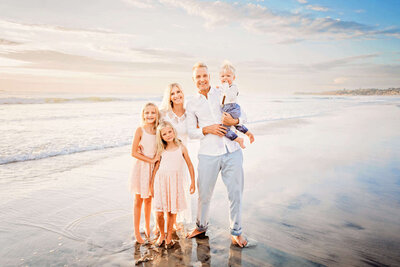 A sweet family at the beach during their Rancho Santa Fe family photography session