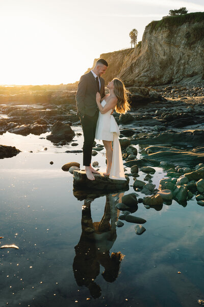 bride and groom spend time at shoreline park beach after their santa barbara courthouse elopement