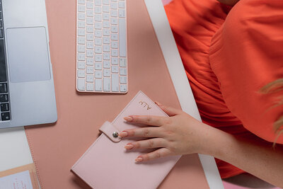 Notebook and computer with a hand