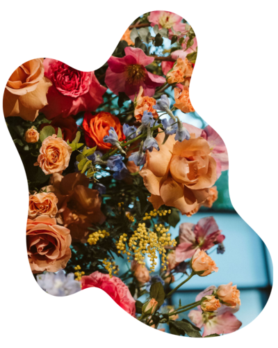 Modern floral arrangement with sculptural design elements, created for a unique Dallas wedding. A bold, artistic take on traditional wedding flowers.