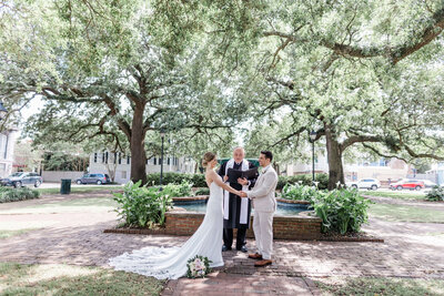 Savannah elopement couple saying vows in a quiet historic square