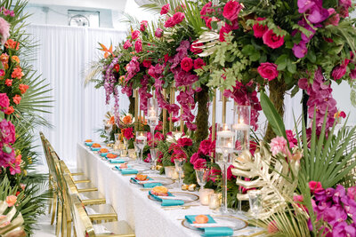 Vibrant floral wedding table setting