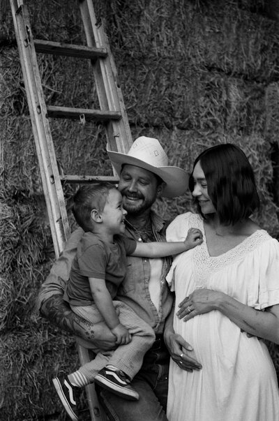 Photographer Suzy Brown guiding a family through a relaxed photo experience.