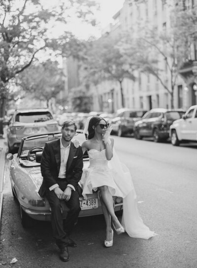 Couple on classic vintage car on the Streets of New York