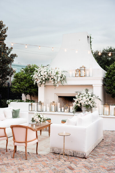 luxury wedding design in New Orleans with white couches and furniture