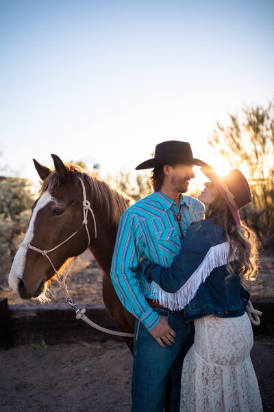 bride and groom with their horse