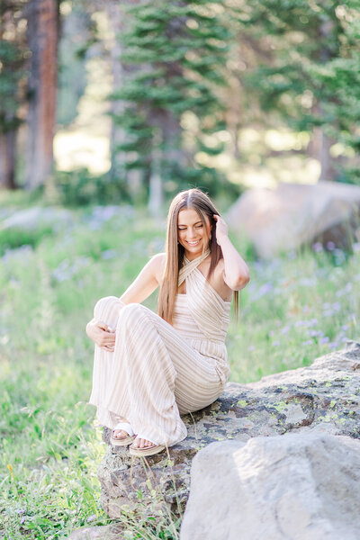 Senior girl posing for photo on the grand mesa in CO