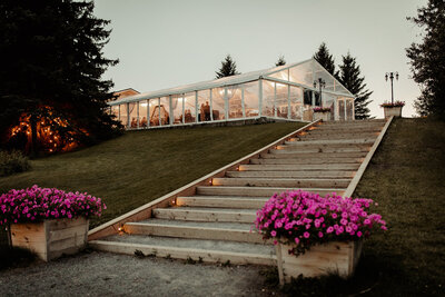 Pine & Pond, a natural picturesque wedding venue in Panoka, AB, featured on the Brontë Bride Vendor Guide.