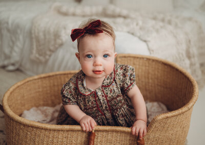 baby girl in bassinet