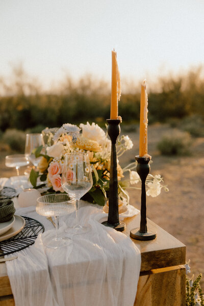 bohemian themed wedding detail photo of tablescape