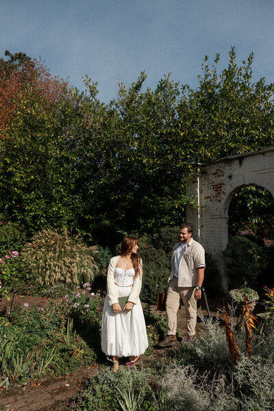 couple embracing at Melbourne wedding venue: Rippon Lea Estate