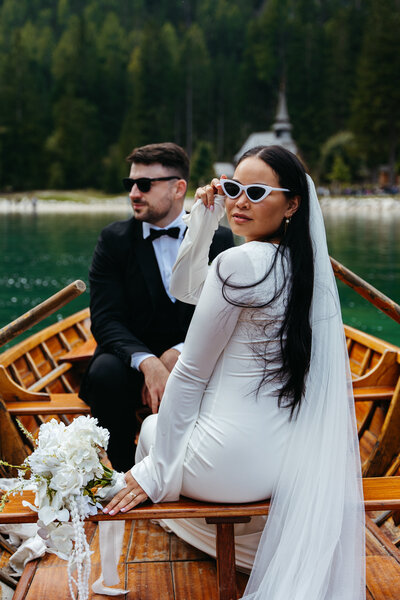 Couple eloping on a boat on Lago di Braies