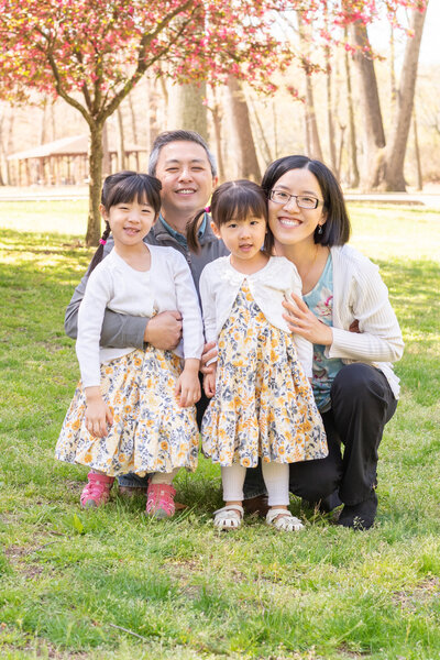 A family of 4 at a park