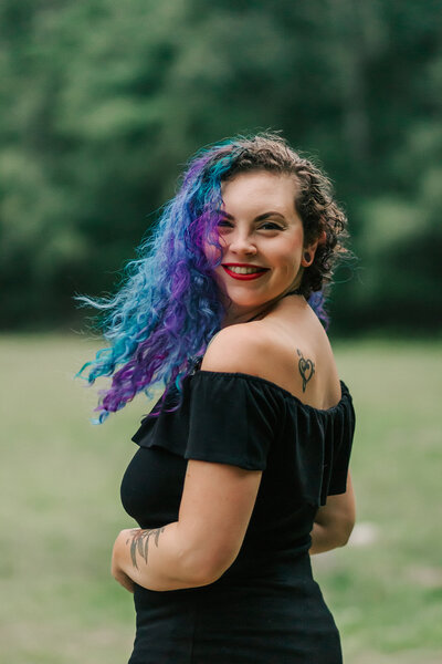 Owner & photographer Ari Leo of Ari Marie Photography, a Boston wedding photographer