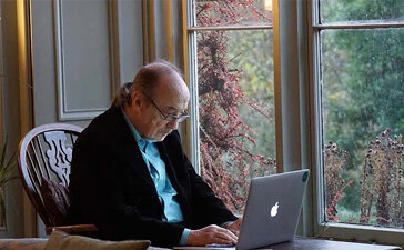 Old man working on laptop