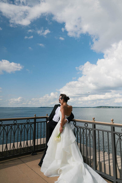 Bride and groom leaning into each other at sweetheart table