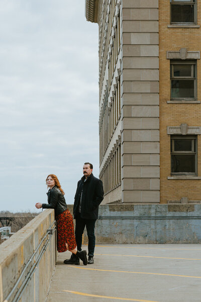 couple looking out over the roof top views downtown 