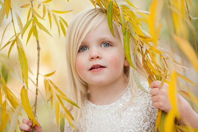 Isabella having her photo taken while on location at Wash Park in Denver