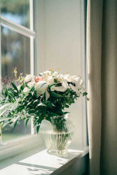 wedding bouquet in front of a window at christiansens farm in mt vernon washington