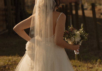 Bride holding her flowers before her wedding in Tallahassee, Florida