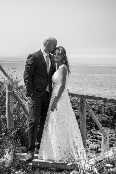 Bride and groom smiling, photographed by Chester wedding photographer.
