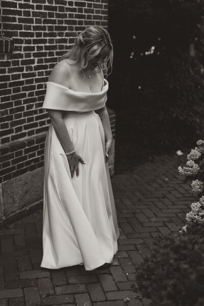Refined bridal portrait inside a timeless mansion venue in New England.