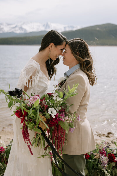 A couple stands at the altar during their Colorado Wedding.