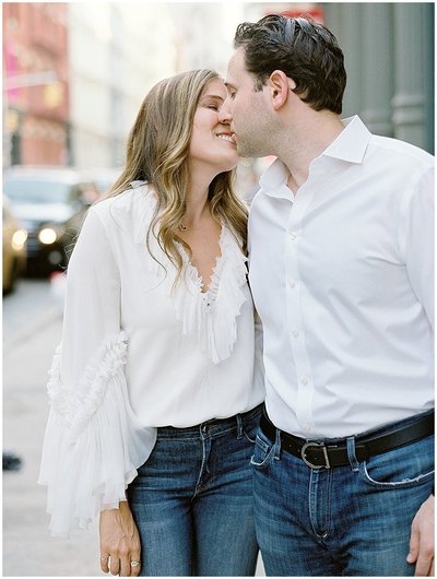 Bride and Groom in Outfits of Jeans and Crisp White Shirts During NYC Engagement Photos © Bonnie Sen Photography