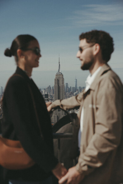 Editorial Couple's Photography in New York City with the Empore state building in the background. Intimate Wedding, Elopement, and Family Photography NYC, International, and Western North Carolina Area 
