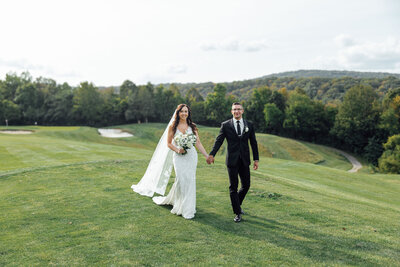 Crystal Springs Resort | Bride and groom walking during afternoon wedding | New Jersey