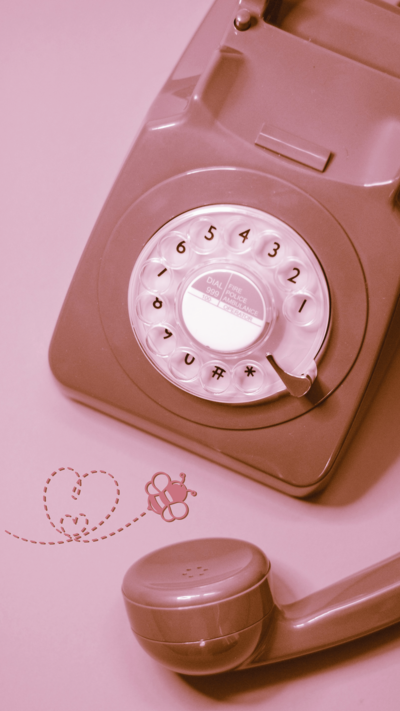 Mauve rotary phone and han