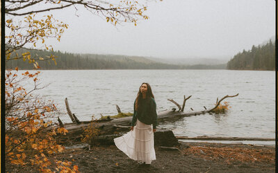 girl standing in front of pittock mansion in portland, oregon