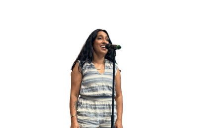 M.J. Johnson voice student singing with microphone on stand