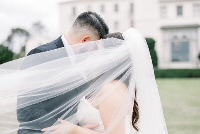 bride and groom dancing together at their indoor wedding reception captured by bay area photographers