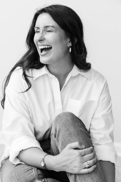Candid laugh portrait photo of photographer Alexandra Robyn