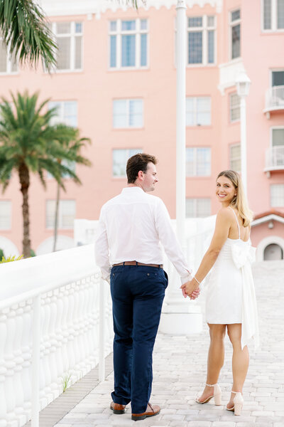 engaged couple walking at don cesarhotel