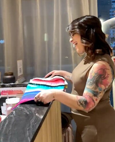 Susan arranging seasonal color swatches during a personal color analysis session in Philadelphia