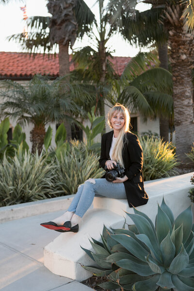 photographer standing on boat off the coast of santa barbara