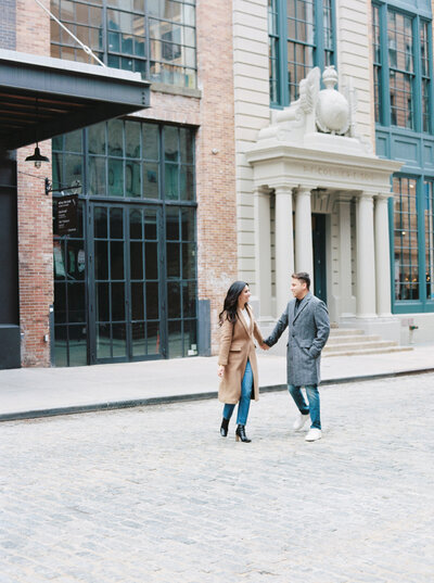 engagement session in meatpacking crossing street'