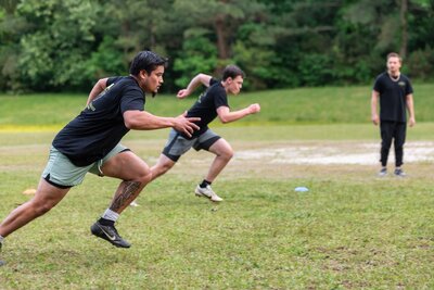 Personal trainers high-fiving