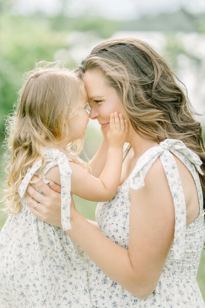 Mom and daughter embrace at family shoot in Milwaukee Wisconsin