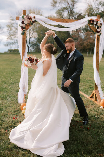 A bride and groom dance at Weeks Farm during their North Carolina Wedding