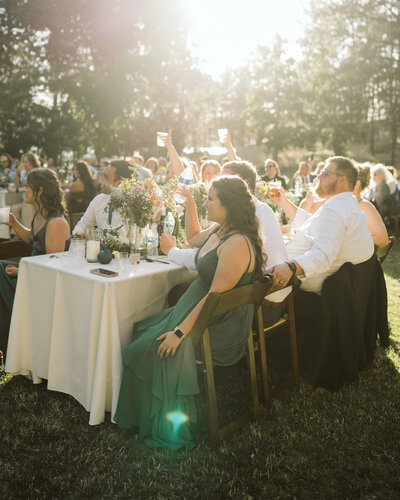 A nature-filled outdoor ceremony in Spokane, highlighting the natural landscape and candid emotion of the day.