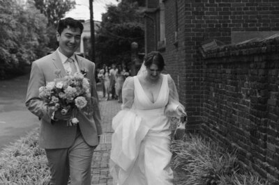 Bride holding a wildflower bouquet during her backyard Richmond wedding, captured in nostalgic editorial style.