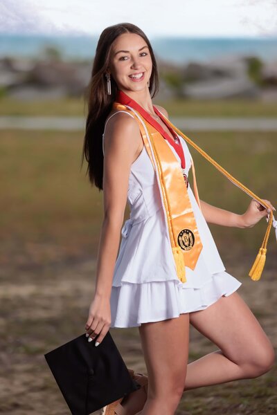 Fun high school senior portraits on a rooftop in Raleigh.