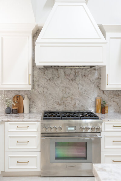 Cristallo natural stone and custom cabinetry in a Longwood home remodel.