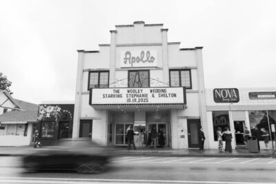 Black and white photo of historic Apollo theater used as wedding backdrop