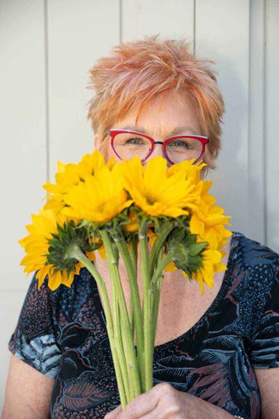 Jane Shine with yellow flowers