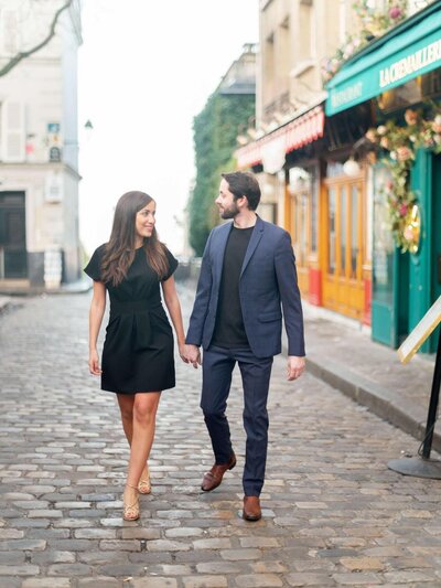 couple walk in montmartre